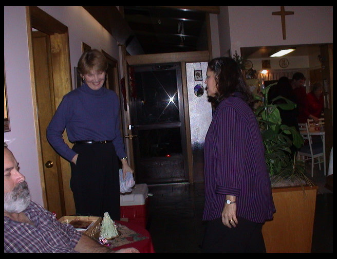 Kate in blue, Grandma Zoe in purple and Grandpa Rick.