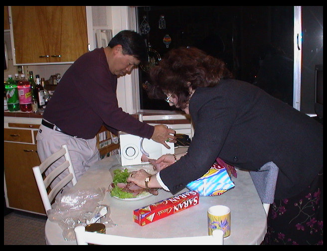 Greg and Katherine preparing food.