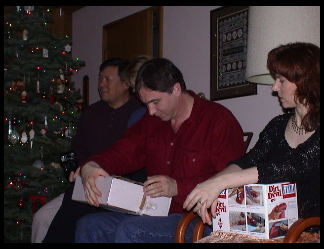 Dave opening his gift.