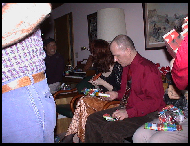 Now what are we opening...oh, stocking stuffers.