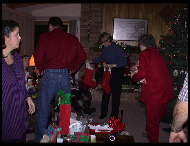 Everyone handing out stocking stuff.