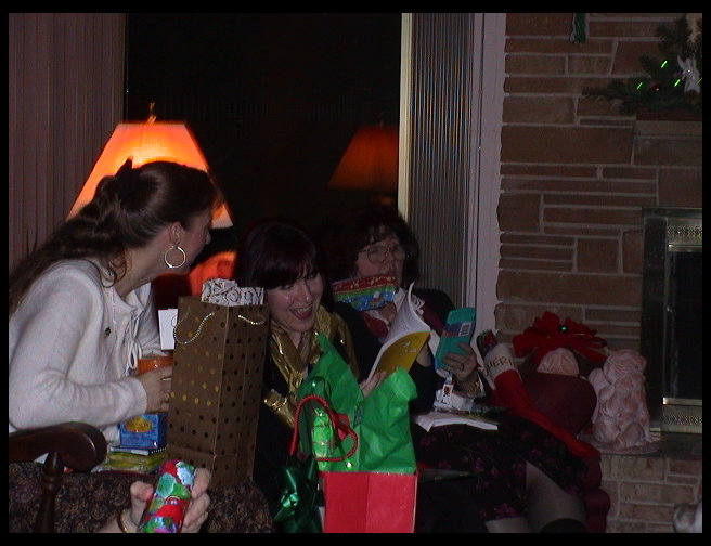 Looks like Kate is enjoying her stocking gifts.