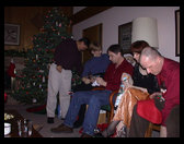 L to Rt: Greg, Kate, Dave, Jennifer and Henry opening stocking stuff.