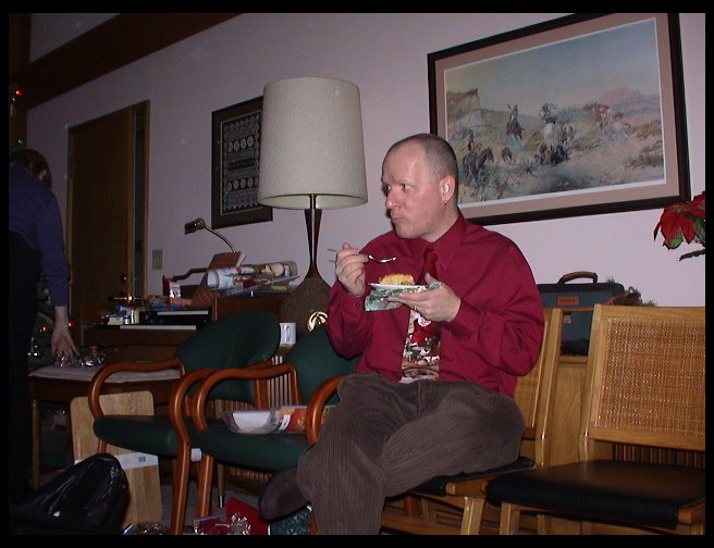 Henry enjoying dessert.