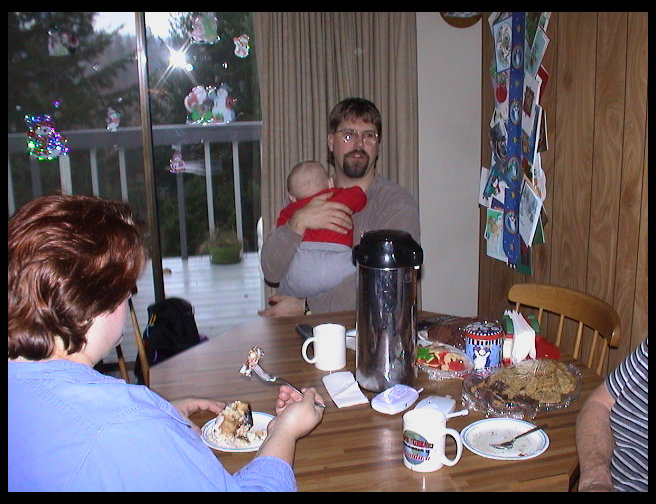 Eating cinnamon rolls for Christmas Breakfast.