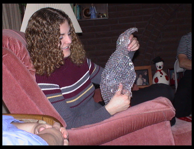 Jennifer unwrapping one of her ornaments.
