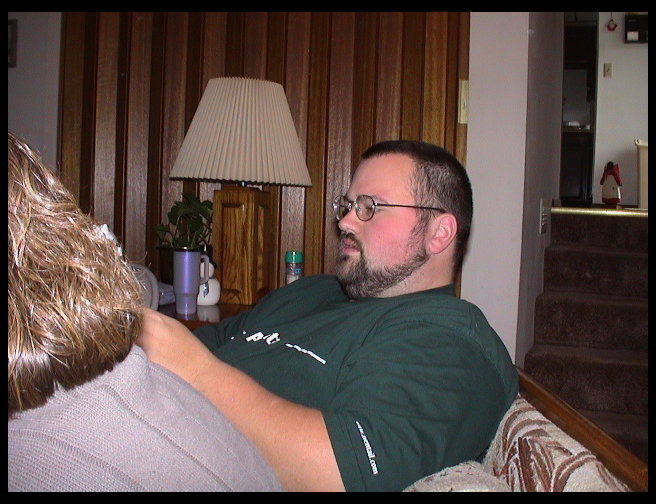 There is Timm opening a gift.