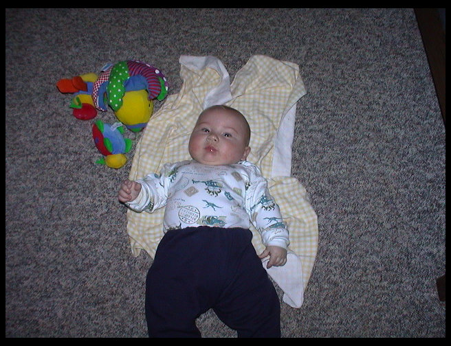 Logan seems to like laying on his back.