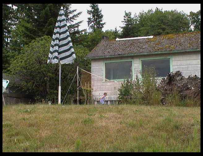 Herb's house with Badmitton set in front. 