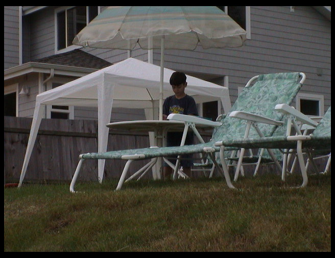 James standing at the table. 