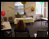 Timm and Sandra seated at the head table.