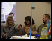 Jess and Kathy looking at something, not sure what though.