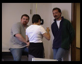 Mark Ross in gray, Steph in white and Pasha in black.