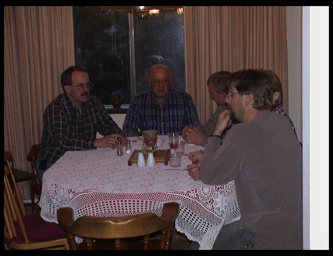 Ron, Dad, Michael and David engaging in after dinner conversation.