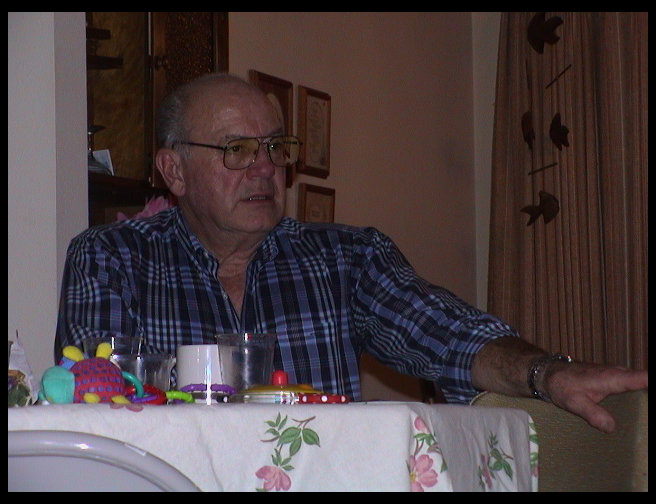 Grandpa watching everyone else.