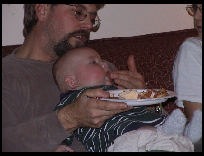 Logan has his first Pumpkin Pie...don't tell mom.