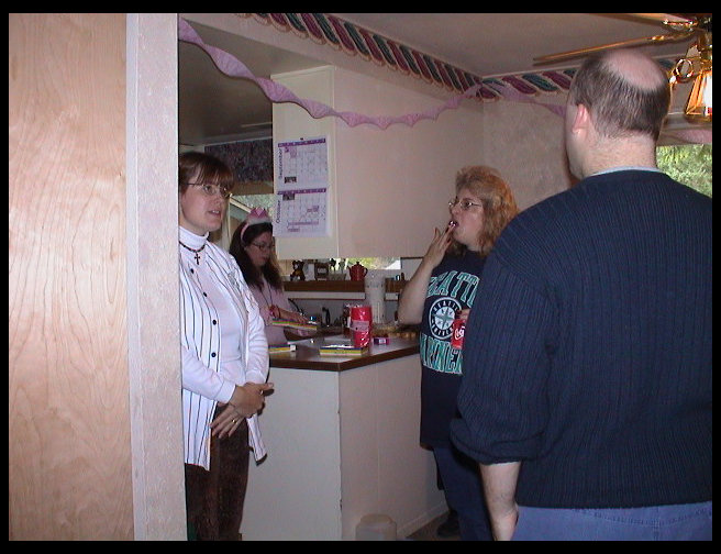 Sandra, Logan and Tess Morgan catching up.