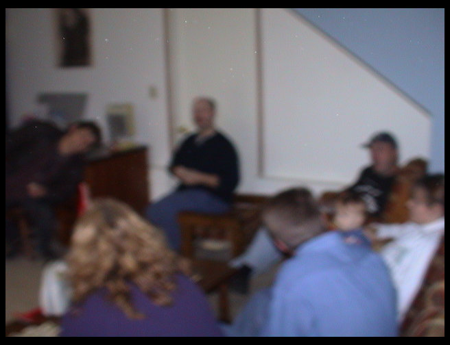 Tess, Juliet, Katrina Hodiak and boyfriend all standing in the kitchen.