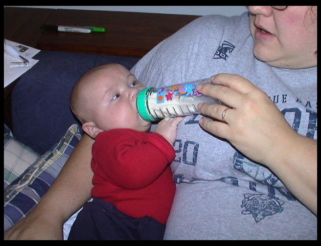 Logan enjoying his bottle.