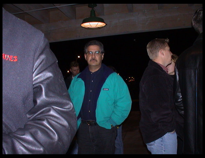 Mr. John Sepulveda waiting to be seated for dinner.