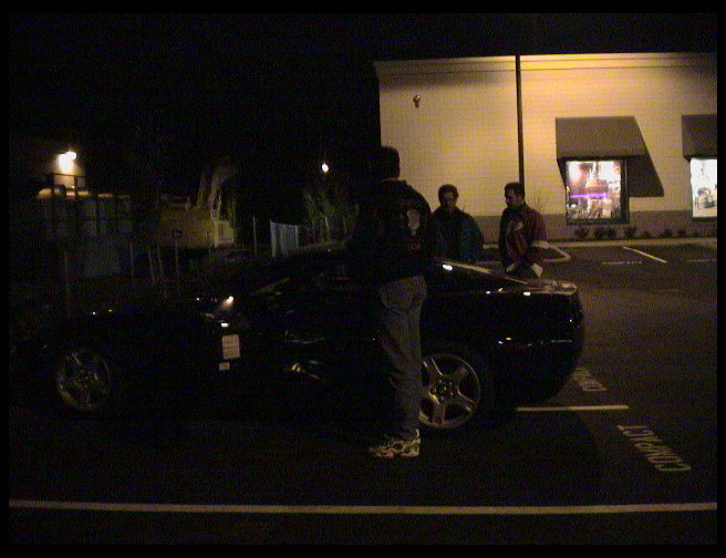 All of us admring the car.