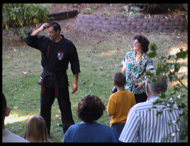 Mr. Graves comes out to his surprise (that's his mom next to him)