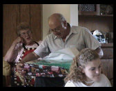 Grandpa opens his gifts