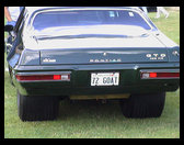 Look at the tires on that GTO.  The front tires weren't much wider that motorcycle tires
