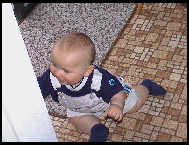 Playing with one of Grandma's things.