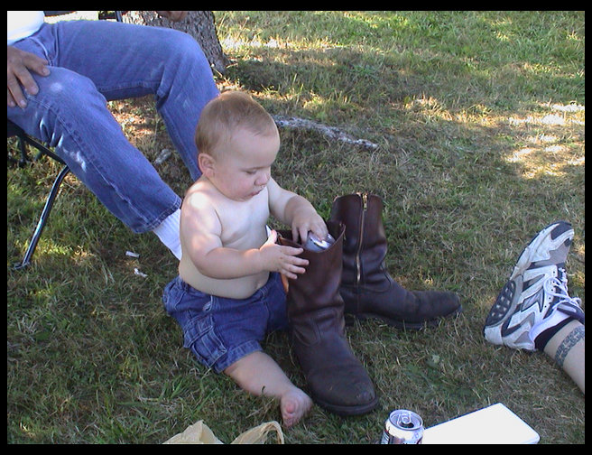Now the cans are in Grandpa Rick's boots.