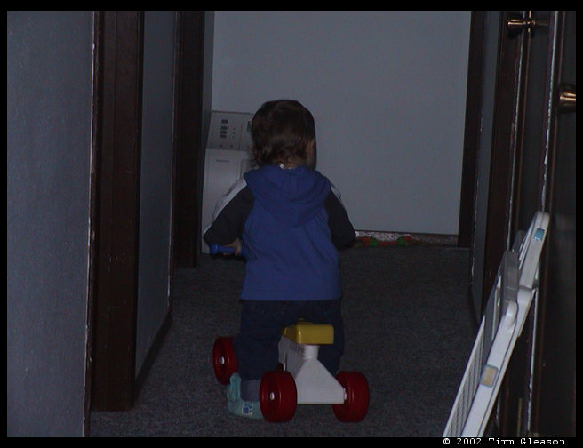 A closeup of Logan on his bike.