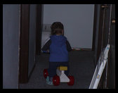 A closeup of Logan on his bike.