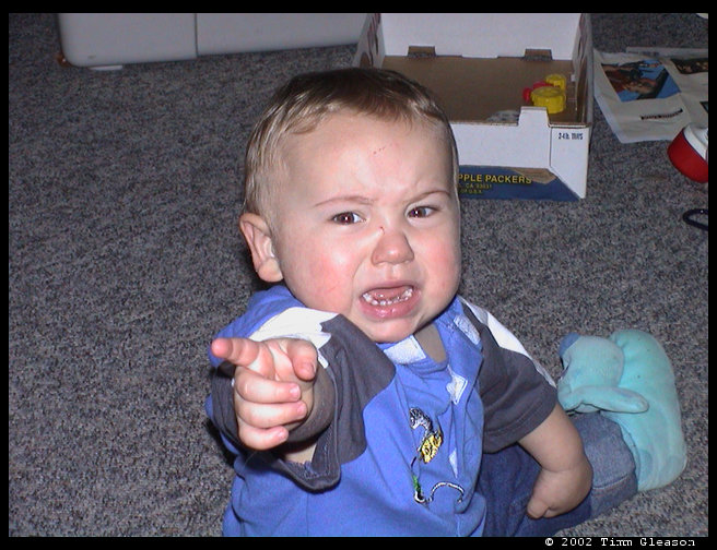 Logan wants the camera - so he protests.