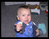 Logan wants the camera - so he protests.