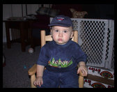 Logan in his patriotic baseball cap.