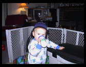Logan ready for bed with his ski hat on.