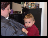 Logan getting ready for his first haircut.