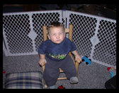 Logan posing in his chair.