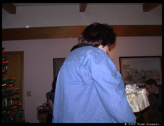 Sandra holding a present.