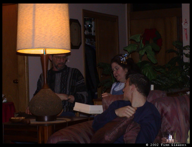 CArl, Catherine and Dave Jr. opening presents.