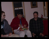 Zac, Greg and Dave taking in Greg's present.