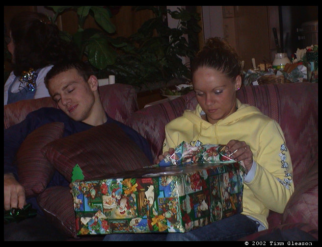 Now it is Amber's turn to open a present.