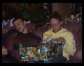 Now it is Amber's turn to open a present.