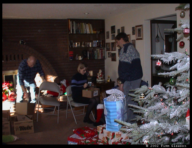 Stockings being distributed and opened.