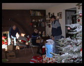 Stockings being distributed and opened.