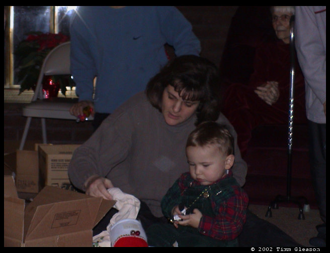 Aunt Kari and Logan looking at stocking stuff.