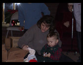 Aunt Kari and Logan looking at stocking stuff.