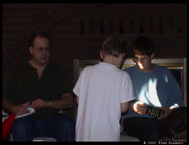 Ron, Kaleb and Tyler checking out their Christmas goods.
