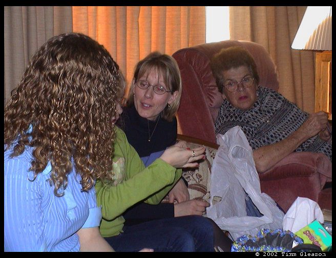 Jennifer, Marianne and Grandma/Mom taking about something interesting.