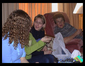 Jennifer, Marianne and Grandma/Mom taking about something interesting.